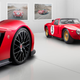 A render of two Bizzarrini sports cars in a factory.